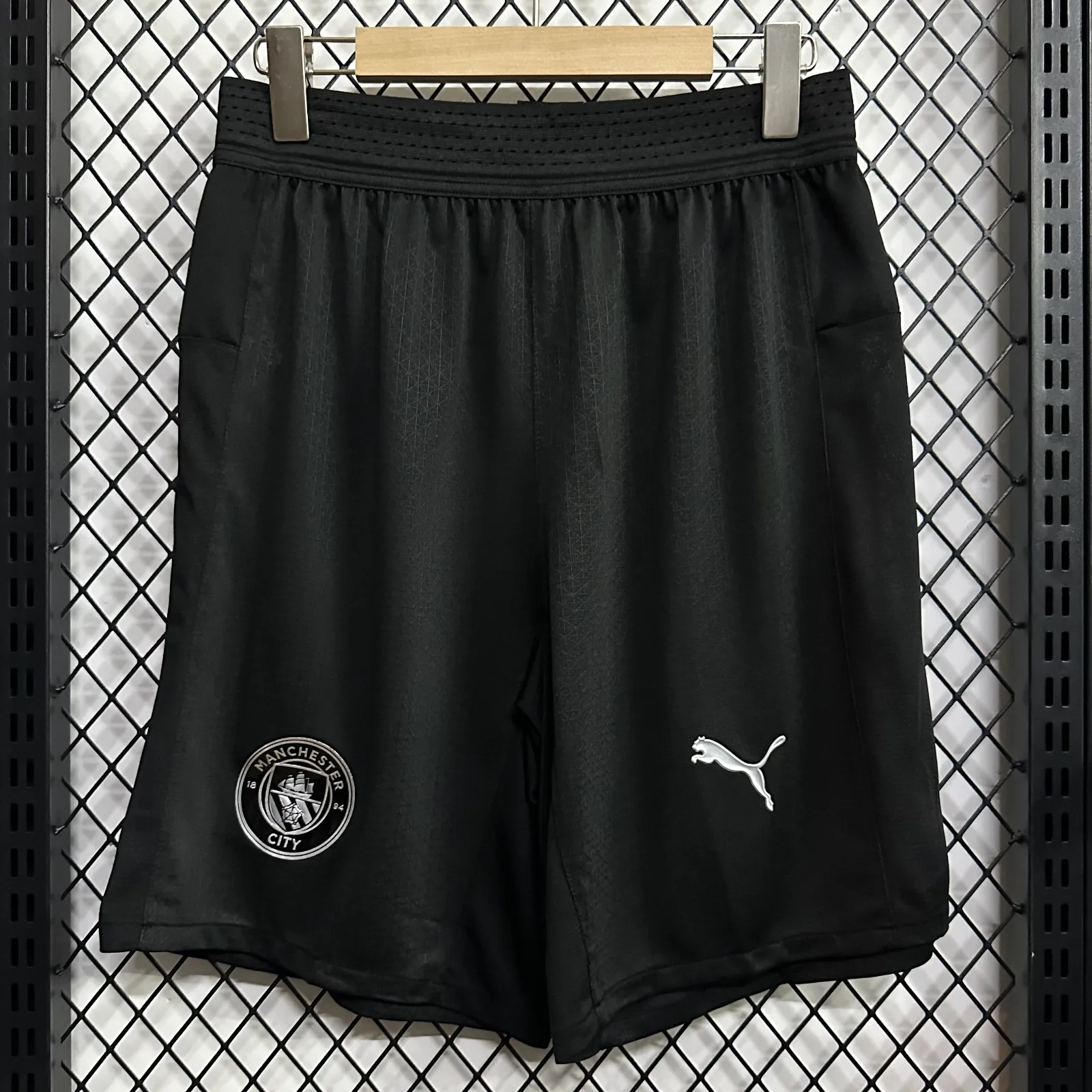 Short Manchester City Suplente 25/26 (frente)